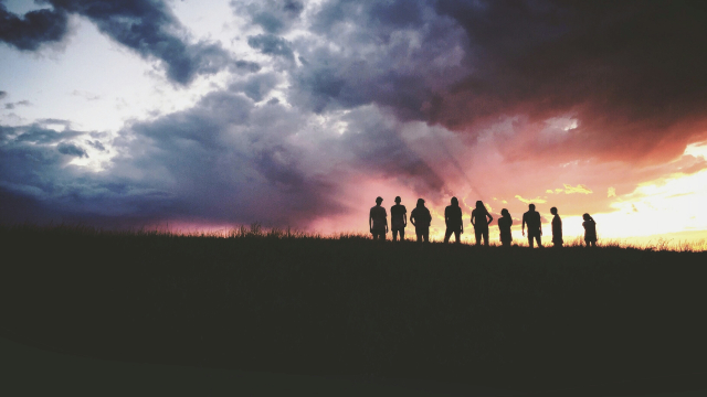 silhouette_group_hillside_clouds_unsplash