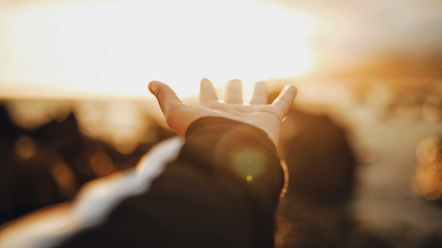 hand_outstretched_golden_hour_unsplash