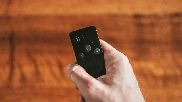 remote_control_hand_play_unsplash