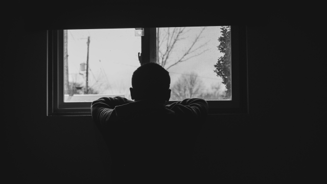 window_pensive_looking_bw_unsplash